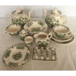 A quantity of Mason's green 'Fruit Basket' tea & breakfast wares.