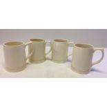 4 Wedgwood Keith Murray cream tankards, one has small chip to underside.