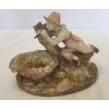 A Royal Worcester Kate Greenaway figurine / trinket bowl of a boy playing a pipe.