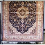 A large Keshan Carpet with blue coloured background design.