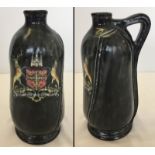 A Royal Doulton flagon decorated with Nottingham coat of arms.