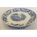 A 19th century blue and white ceramic footed dish.