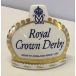 A Royal Crown Derby ceramic advertising plaque.