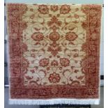 A Ziegler rug with beige coloured background design.