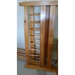 A pine double bed frame.