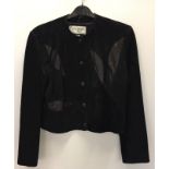 A 1980s black suede and leather cropped jacket bust 38 inches. By Dockers of Paris, France.