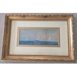 An unsigned gilt framed watercolour depicting 3 sailing ships.