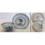 A Nanking Cargo matching cup and saucer with blue pine design.