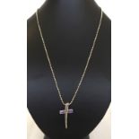 Modern design silver cross and chain.