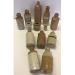 A box of vintage stoneware bottles.