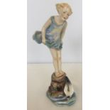 A Royal Worcester Figurine "Sea Breeze" depicting a girl paddling by the sea.