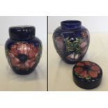 A signed William Moorcroft lidded jar.