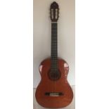 A Valencia full size classical guitar with zip up carry case.