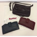 An aubergine leather over-body small bag and 2 leather purses by Hotter.