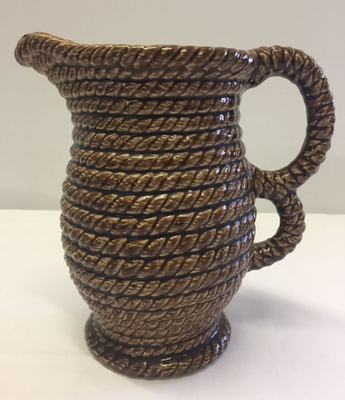 A vintage Govancroft coiled rope jug, 20cm tall.