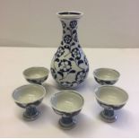 5 blue & white stem cups together with a blue and white vase - all mid 20th century. Vase 18cm tall.