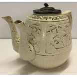 A large 19th century double spout tea pot with pewter lid.