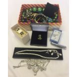 A box of assorted modern costume jewellery.