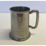 A pewter Naval tankard.