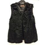 Black International faux fur jacket.