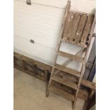 2 wooden ladders