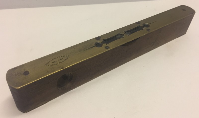 A John Rabone & Sons small spirit level with brass top