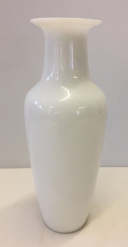 A white glass vase believed to be Peking glass.