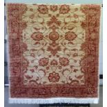 A Ziegler rug with beige coloured background design.