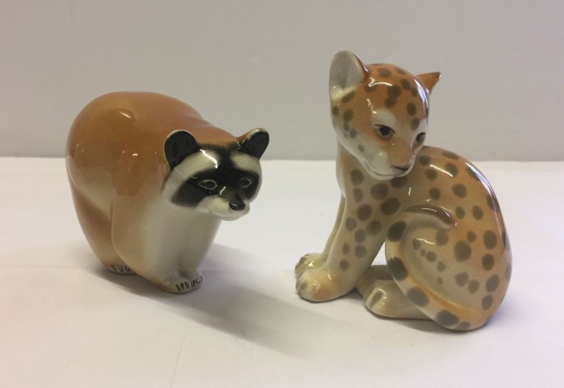 2 Lomonosov/USSR ceramic figurines. A racoon and a leopard.