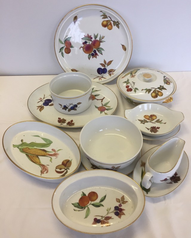 A collection of Royal Worcester " Evesham" dinnerware comprising of 11 pieces.