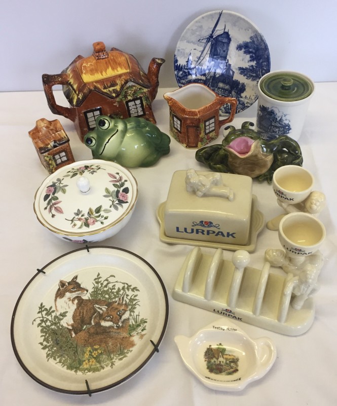 Box of assorted ceramic pieces.