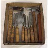 A box of vintage wood working tools.