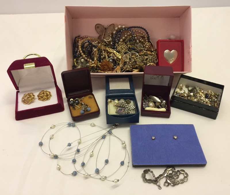 A box containing a quantity of costume jewellery.