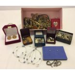 A box containing a quantity of costume jewellery.