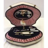 A vintage decorative musical manicure set.