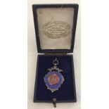 A cased 1937 silver Boy's Club medal.