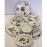 A collection of Royal Worcester " Evesham" dinnerware comprising of 11 pieces.