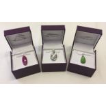 3 boxed costume jewellery necklaces.