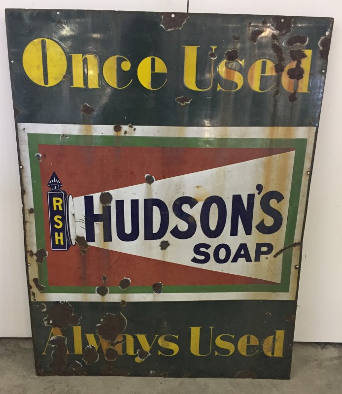 A large enamel advertising sign for Hudson's Soap.