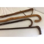 4 vintage wooden walking sticks