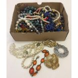 A box containing a quantity of mostly vintage costume jewellery.