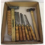A box of vintage wood working tools.