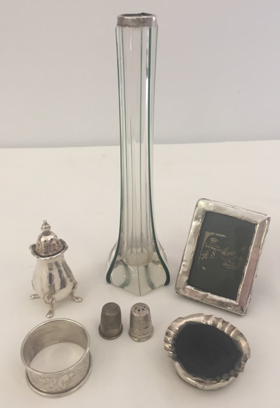 A collection of antique silver/part silver items.