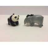 A small Beswick panda figurine together with a Beswick Disney productions Eeyore.