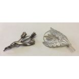 2 vintage silver brooches.