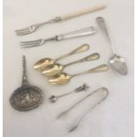 A small collection of silver & silver plated spoons and forks.