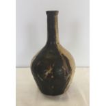 A studio pottery slim necked stoneware vase.