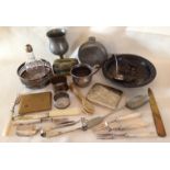 A small collection of metal ware items.