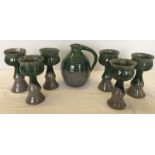 A jug and 6 matching goblets made by Cyril Braunton, St. Helens Pottery.