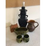 A small collection of Holkham Pottery to include lamp base (small chip to base), money box & jug.